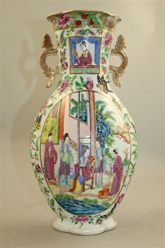 A Chinese Canton-decorated famille rose two handled vase, Jiaqing / Daoguang period, 31.5cm, rim chip